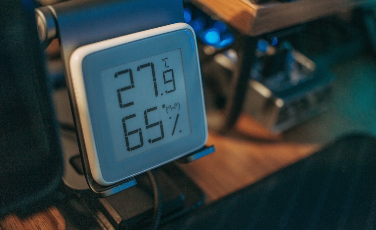 Mastering the First Impression: Your intriguing post title goes here Close-up of a digital hygrometer showing temperature and humidity indoors.