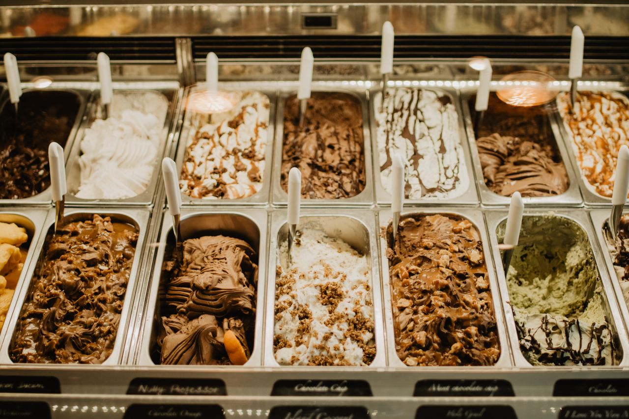 Crafting Captivating Headlines: Your awesome post title goes here A close-up view of various gelato flavors in trays at a store.